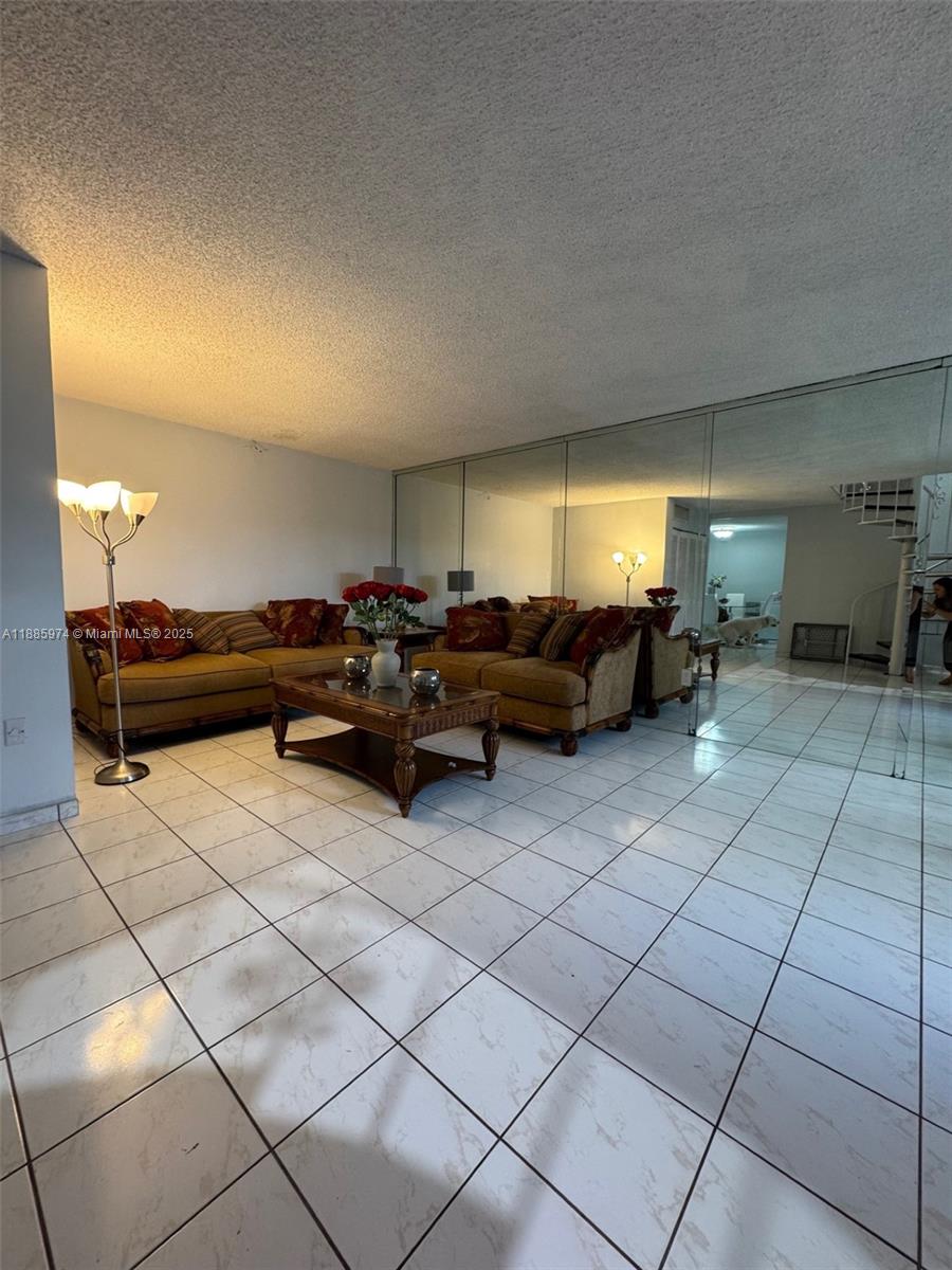 2410 Southwest 122nd Court, Unit 1 Miami, FL 33175 - Photo 11 of 26 a living room with furniture