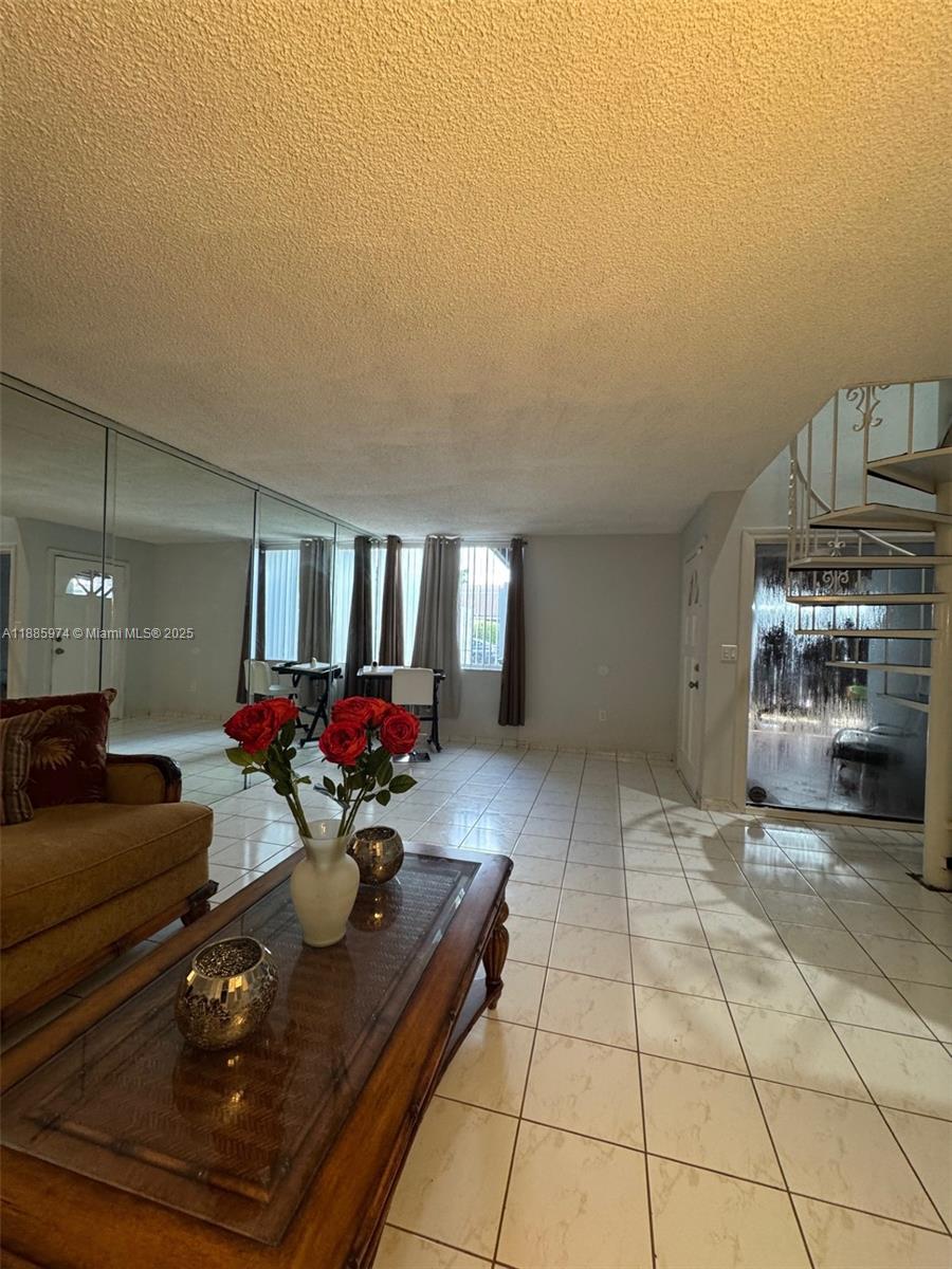 2410 Southwest 122nd Court, Unit 1 Miami, FL 33175 - Photo 24 of 26 a living room with furniture