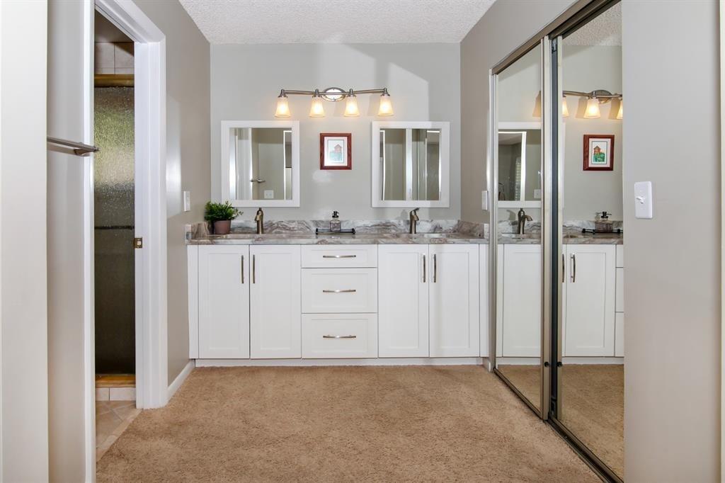5737 Southwest 89th Way Cooper City, FL 33328 - Photo 13 of 23 a bathroom with a granite countertop sink and mirror