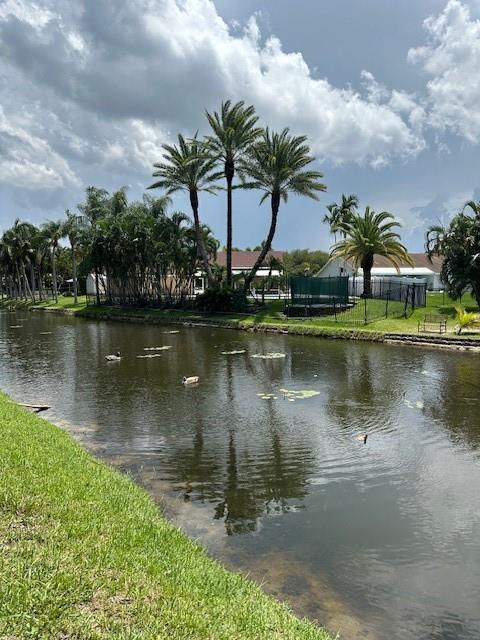 5737 Southwest 89th Way Cooper City, FL 33328 - Photo 17 of 23 a view of a lake with a beach