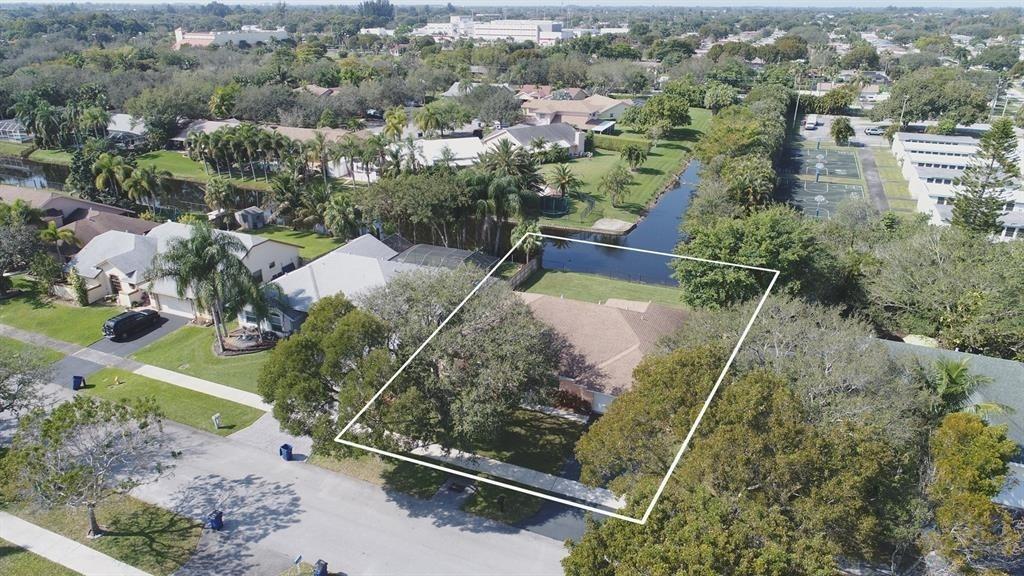 5737 Southwest 89th Way Cooper City, FL 33328 - Photo 2 of 23 an aerial view of a residential houses with outdoor space and trees