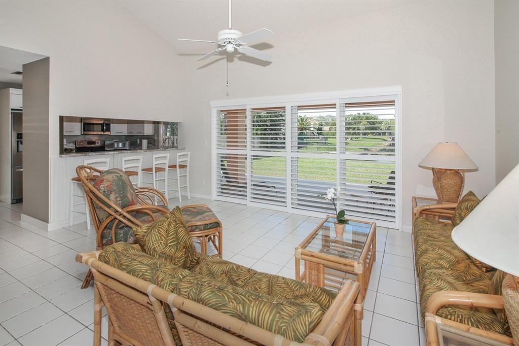 5737 Southwest 89th Way Cooper City, FL 33328 - Photo 7 of 23 a living room with furniture and a flat screen tv