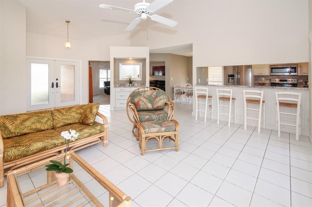 5737 Southwest 89th Way Cooper City, FL 33328 - Photo 9 of 23 a living room with furniture and flat screen tv