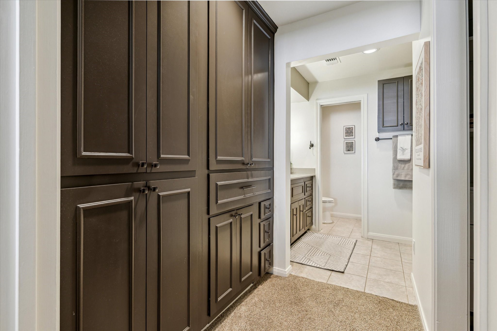 7523 Del Monte Drive Houston, TX 77063 - Photo 21 of 41 a view of a hallway with wooden floor and staircase