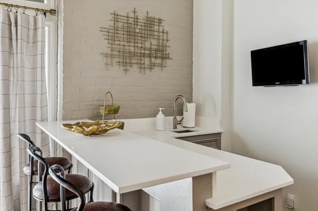 a view of a dining room with furniture