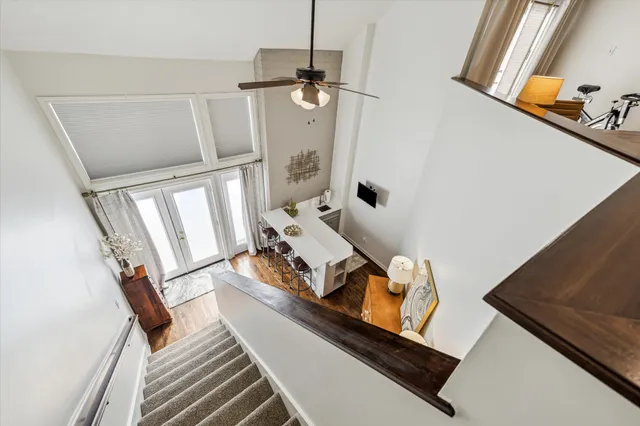a view of a living room with furniture and a window