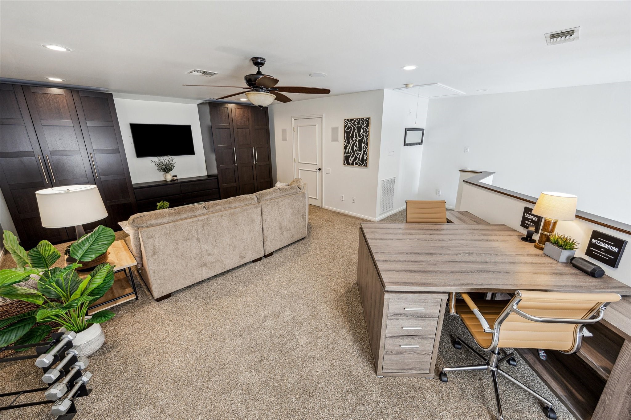 7523 Del Monte Drive Houston, TX 77063 - Photo 31 of 41 a living room with furniture and a flat screen tv