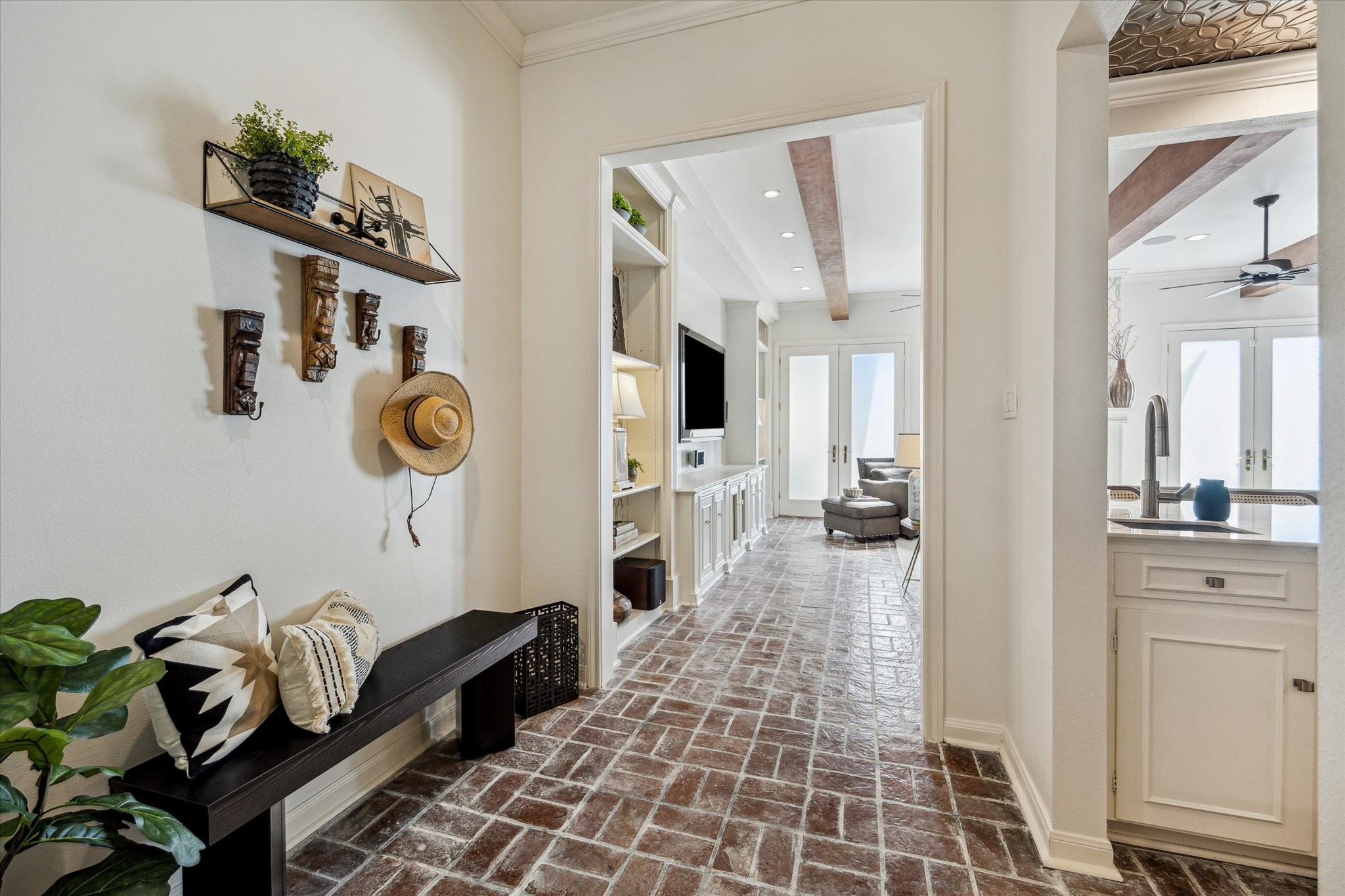 7523 Del Monte Drive Houston, TX 77063 - Photo 4 of 41 a hallway with a baby crib
