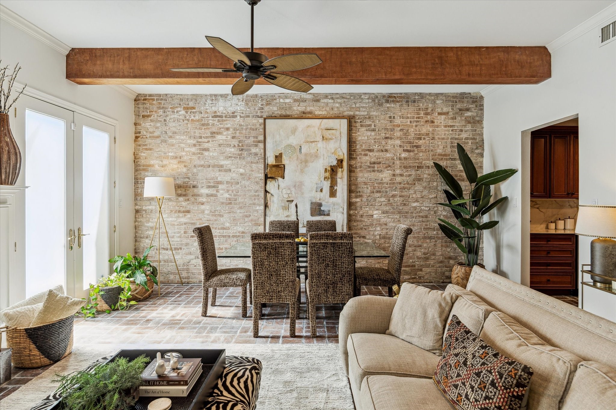 7523 Del Monte Drive Houston, TX 77063 - Photo 8 of 41 a living room with furniture a dining table and a potted plant
