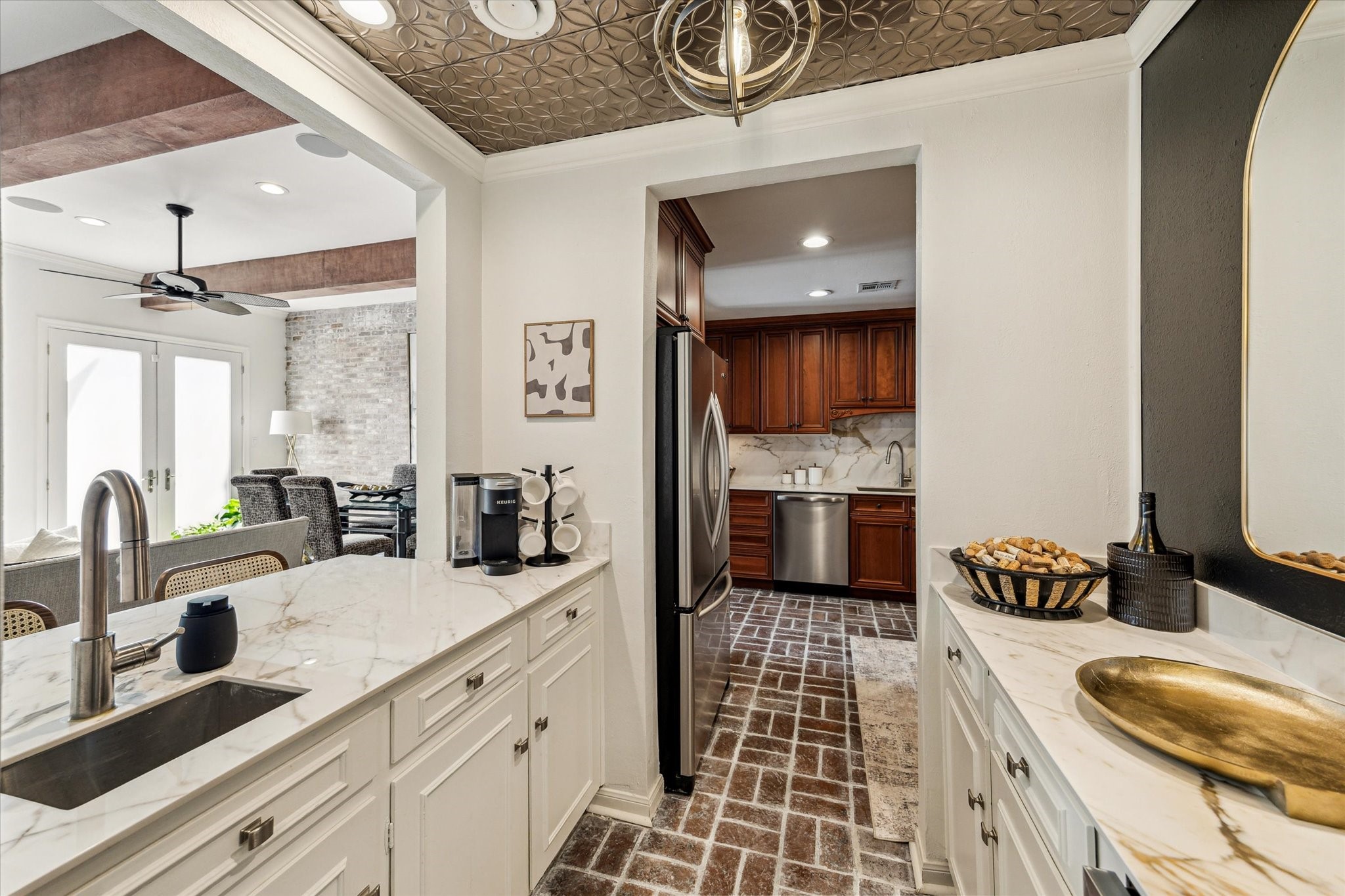 7523 Del Monte Drive Houston, TX 77063 - Photo 10 of 41 a kitchen with a sink and a stove top oven