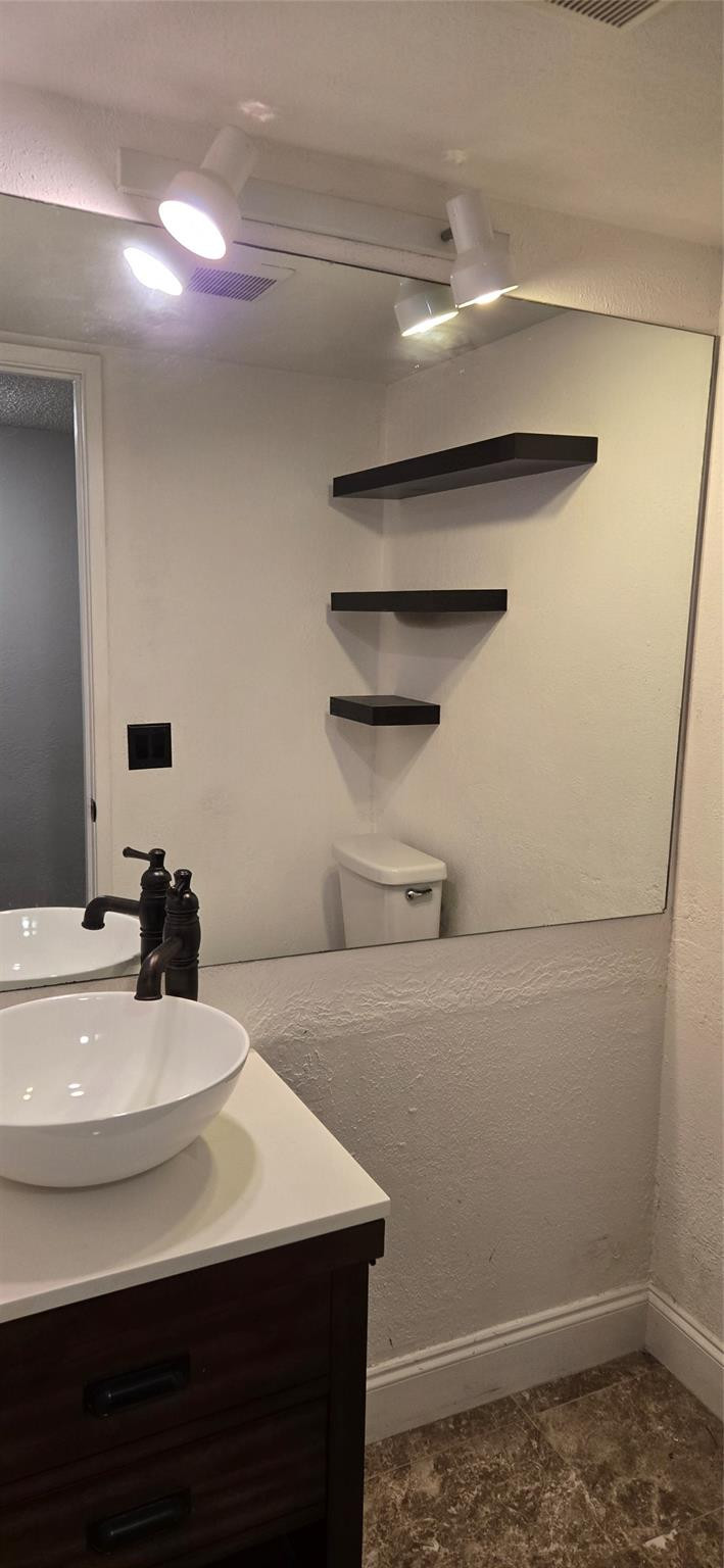 8951 North New River Canal Road, Unit 1B Plantation, FL 33324 - Photo 15 of 22 I love the lighting and shelves.