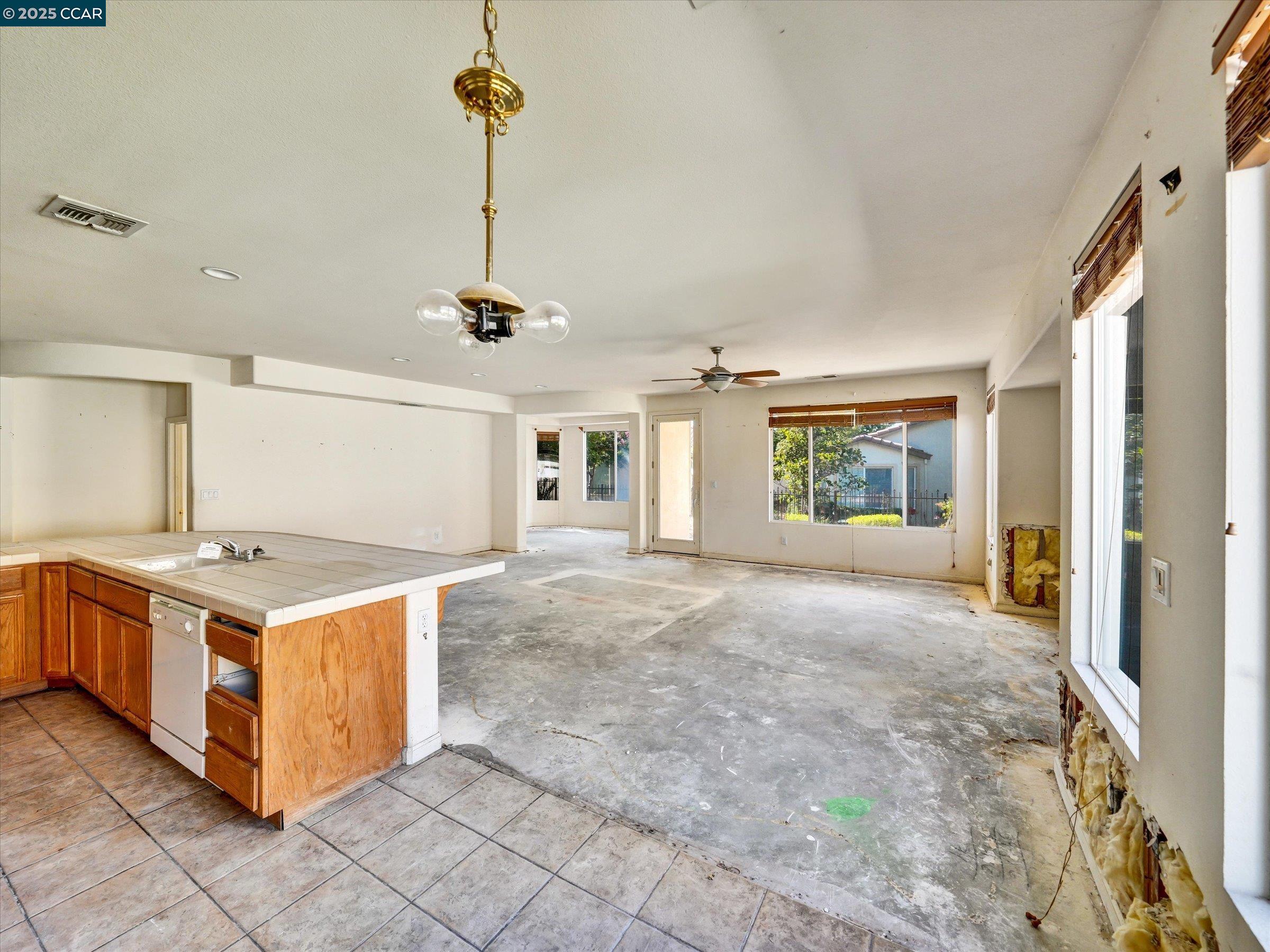 329 Brockton Place Rio Vista, CA 94571 - Photo 9 of 29 a kitchen with a stove and a refrigerator