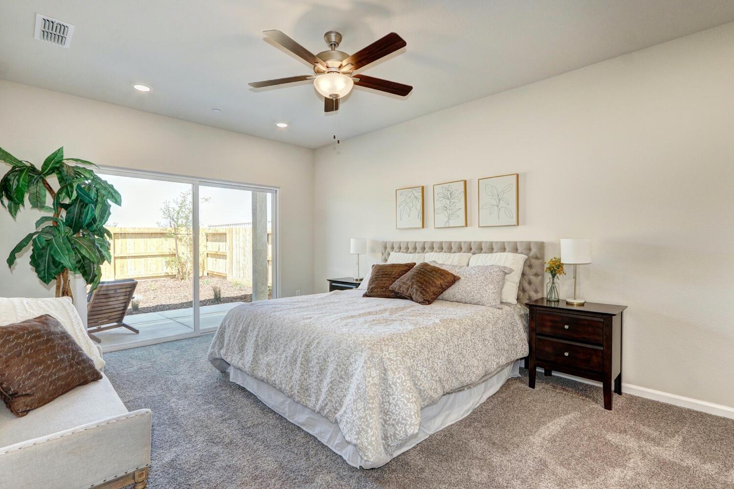 1071 Hogan Road Galt, CA 95632 - Photo 14 of 17 *Owner's Suite with large slider to covered patio.