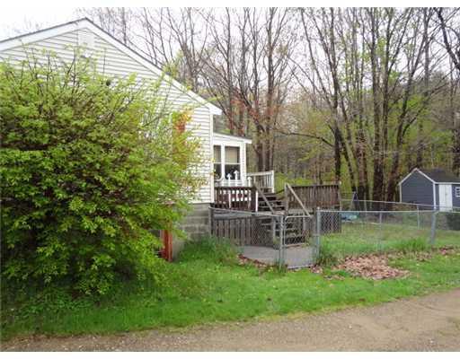29 Mills Road Kennebunkport, ME 04046 - Photo 17 of 21 Exterior Back. Fenced in back yard.