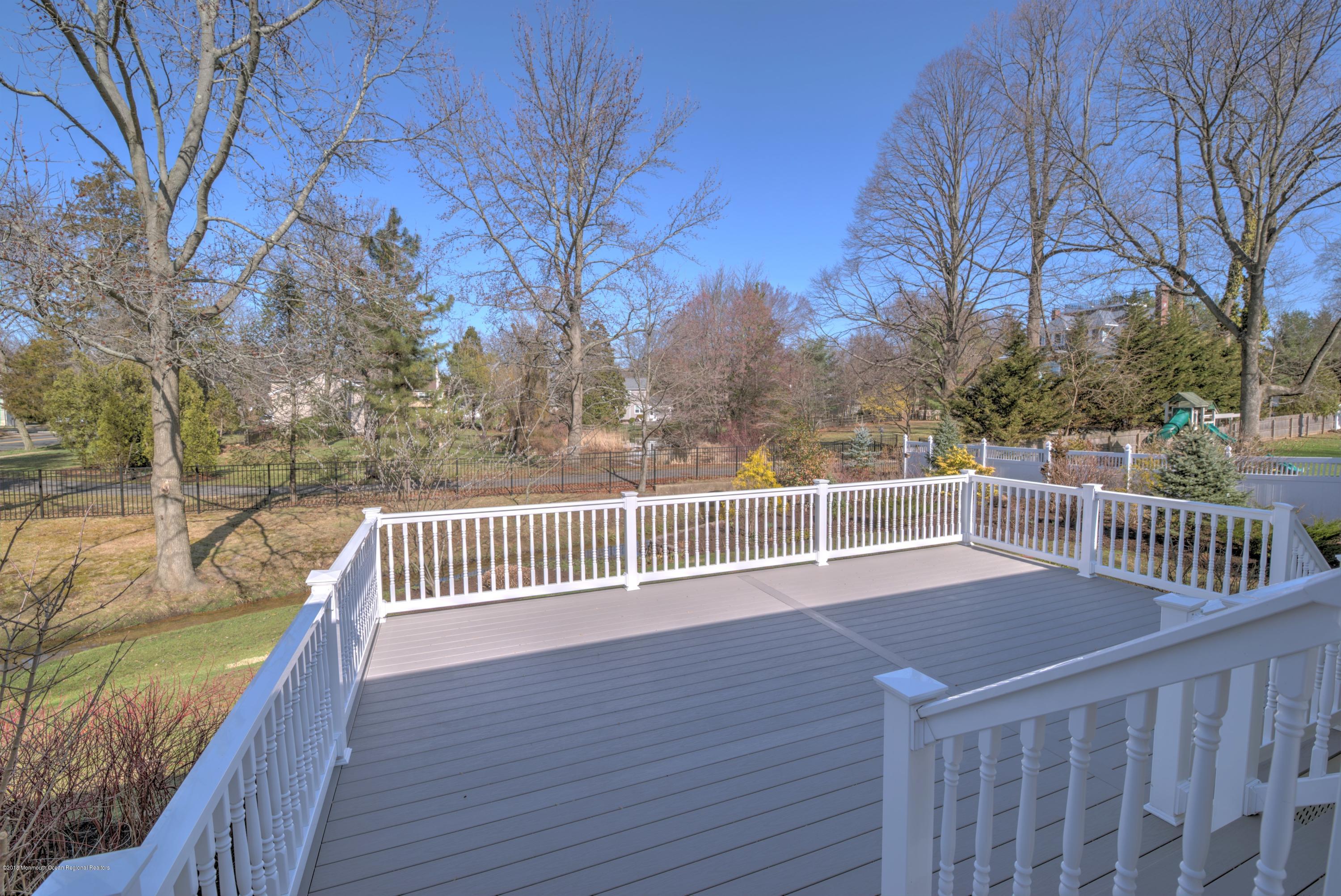 2 Ruddy Court Little Silver, NJ 07739 - Photo 16 of 19 a view of deck with a large trees