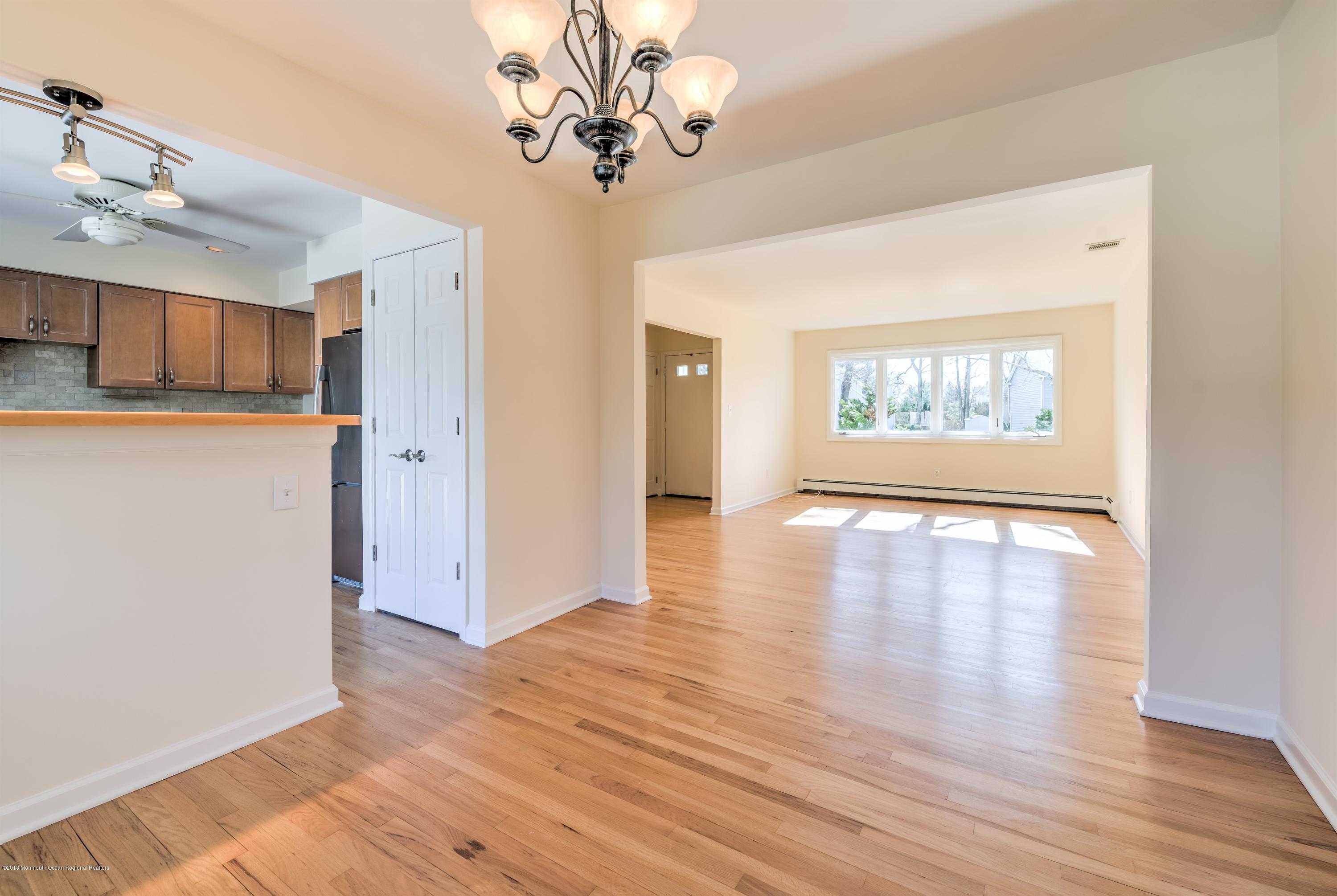 2 Ruddy Court Little Silver, NJ 07739 - Photo 6 of 19 wooden floor in an empty room with a window