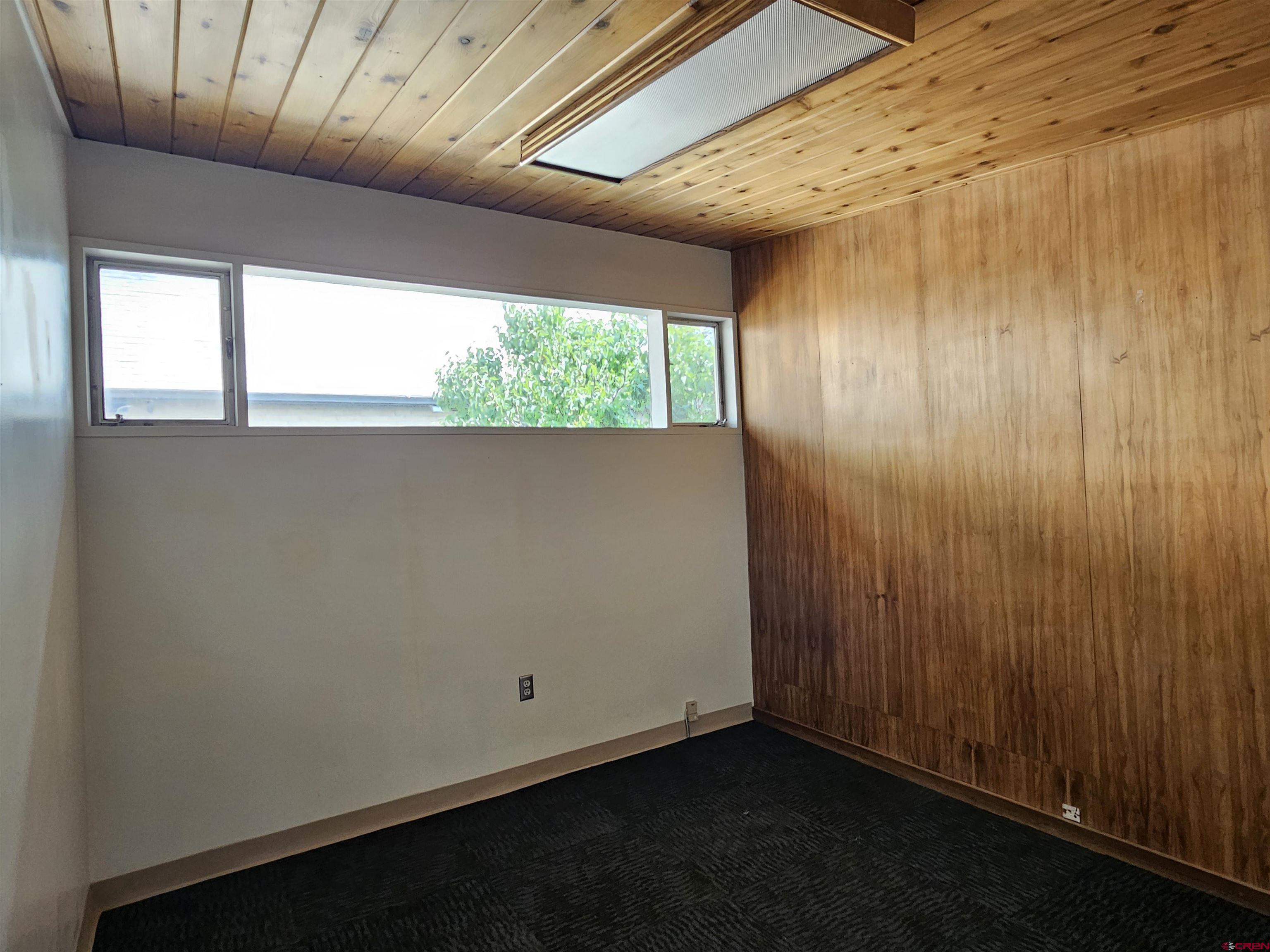 555 Meeker Street Delta, CO 81416 - Photo 11 of 19 an empty room with a window