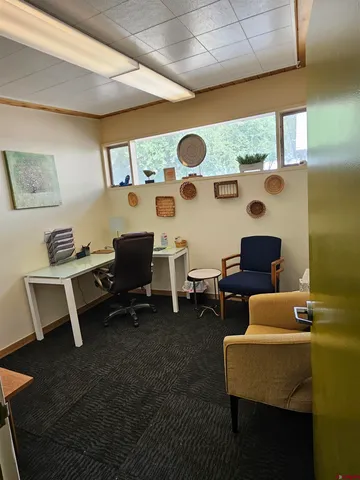 a room with table and chairs