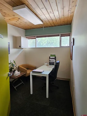 a room with furniture and window