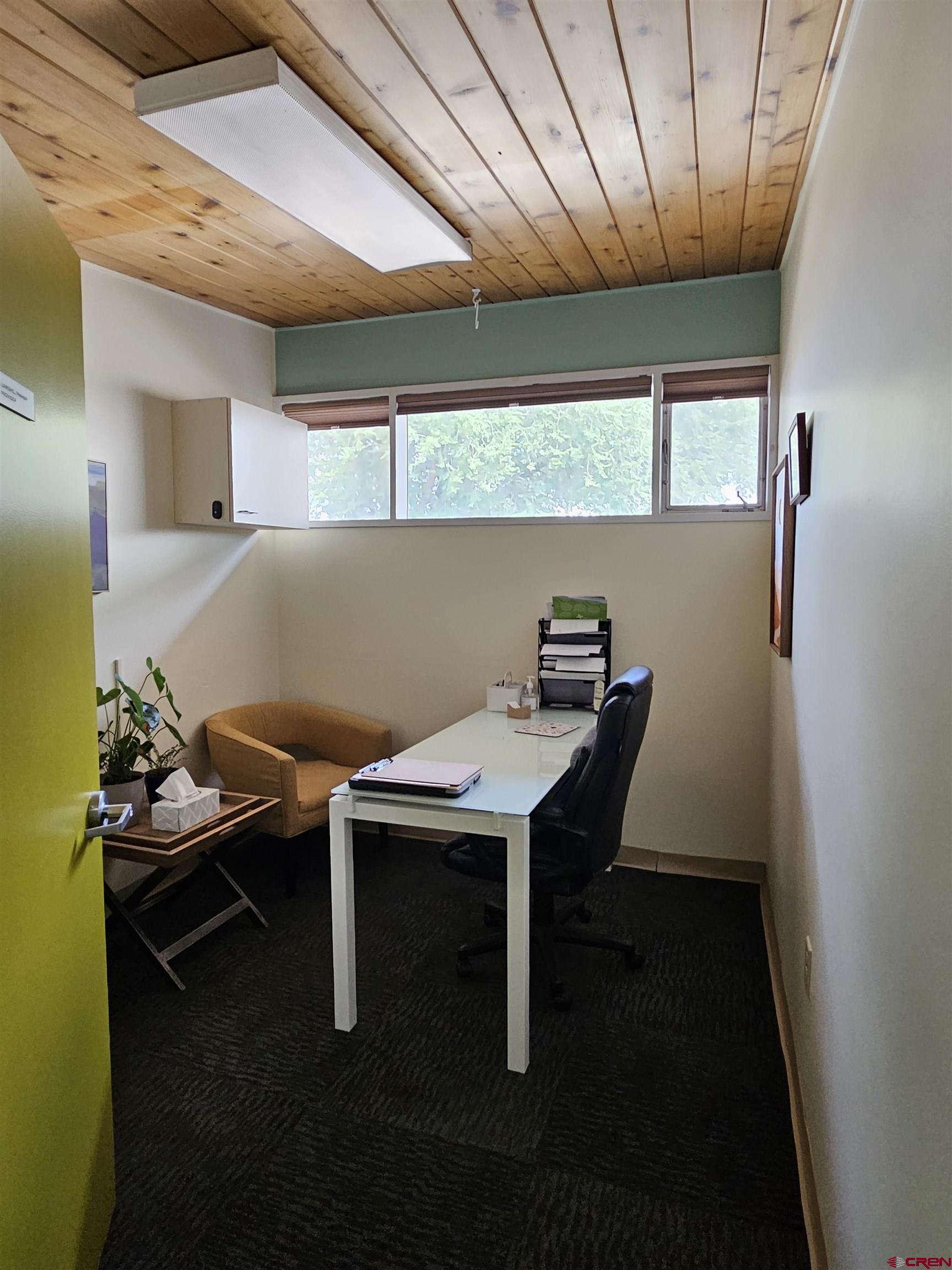555 Meeker Street Delta, CO 81416 - Photo 15 of 19 a room with table and chairs