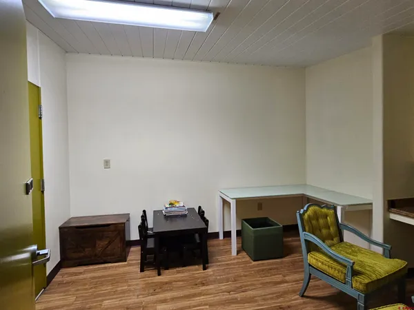 a view of a room with a wooden roof