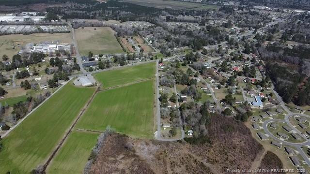 Allen Street Lumberton, NC 28359 - Photo 14 of 17 a green field with lots of tress in it