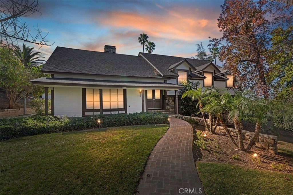 2154 Gainsborough Drive Riverside, CA 92506 - Photo 1 of 43 a front view of a house with a yard