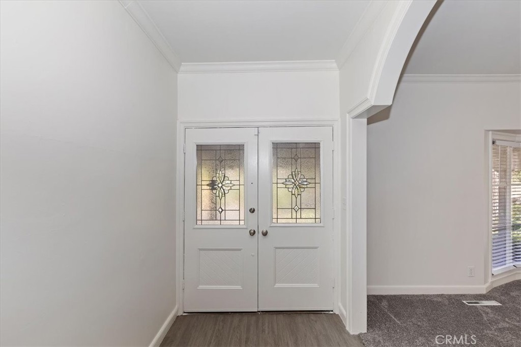 2154 Gainsborough Drive Riverside, CA 92506 - Photo 13 of 43 an empty room with windows