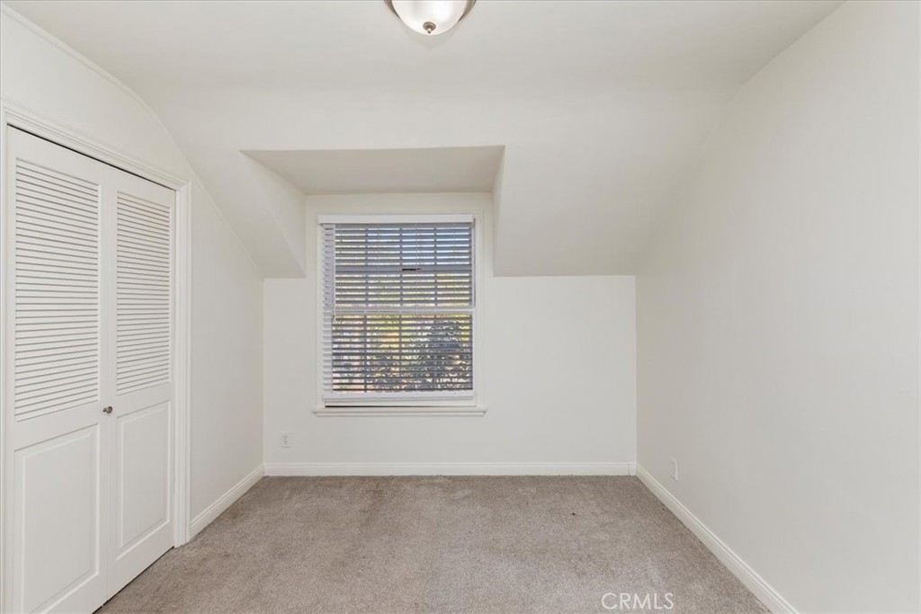2154 Gainsborough Drive Riverside, CA 92506 - Photo 36 of 43 an empty room with a window
