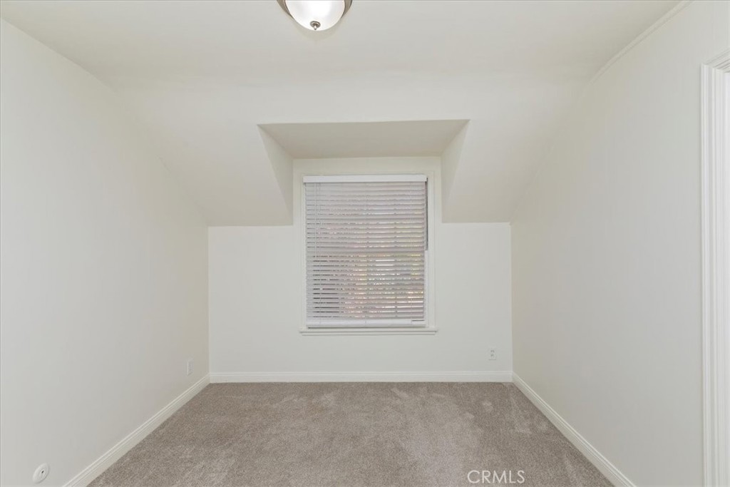 2154 Gainsborough Drive Riverside, CA 92506 - Photo 37 of 43 a view of an empty room with a window