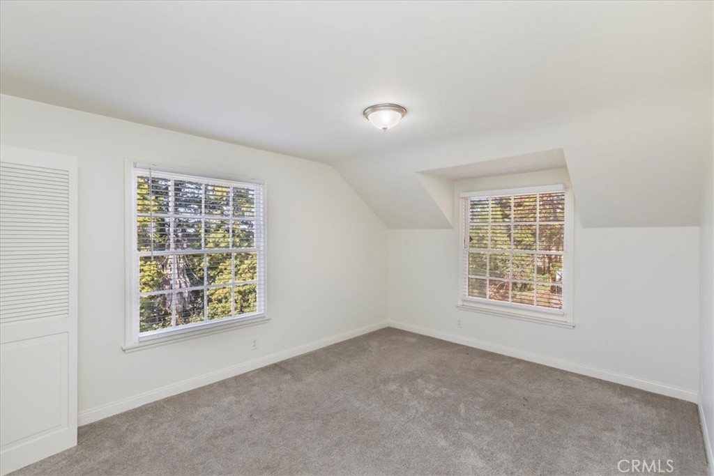 2154 Gainsborough Drive Riverside, CA 92506 - Photo 39 of 43 an empty room with windows