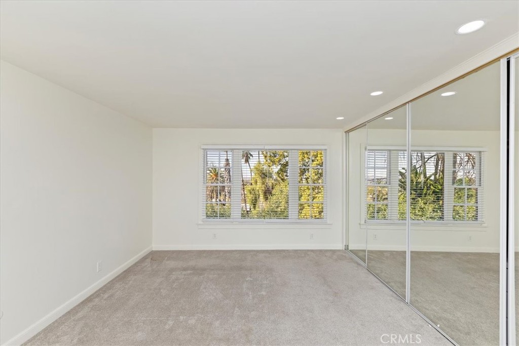 2154 Gainsborough Drive Riverside, CA 92506 - Photo 40 of 43 an empty room with windows