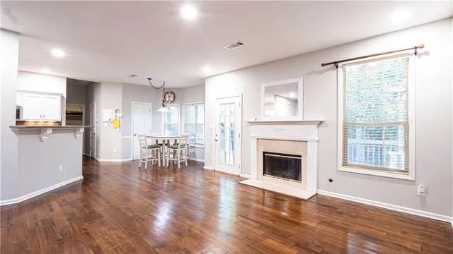 a view of a kitchen with furniture and a fireplace
