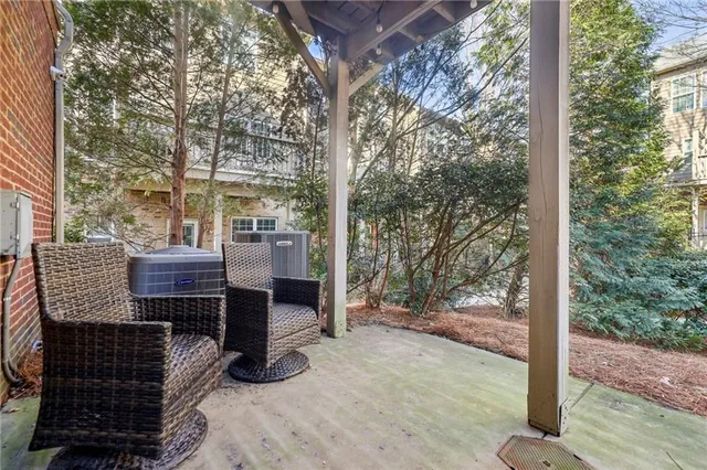 a view of a patio with a yard