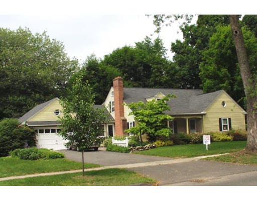 184 Maple Road Longmeadow, MA 01106 - Photo 1 of 1 a front view of a house with a yard and trees