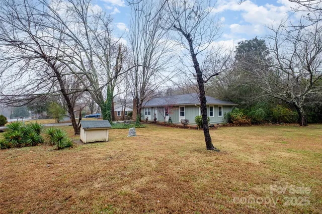 a house with trees in front of it