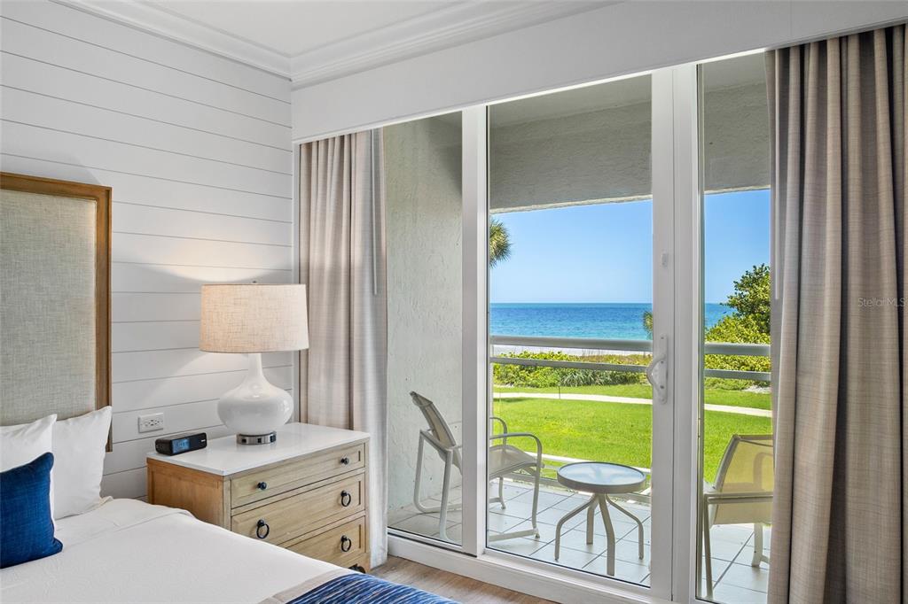 240 Sands Point Road, Unit 4104 Longboat Key, FL 34228 - Photo 7 of 47 a very nice looking room with a large window and front door