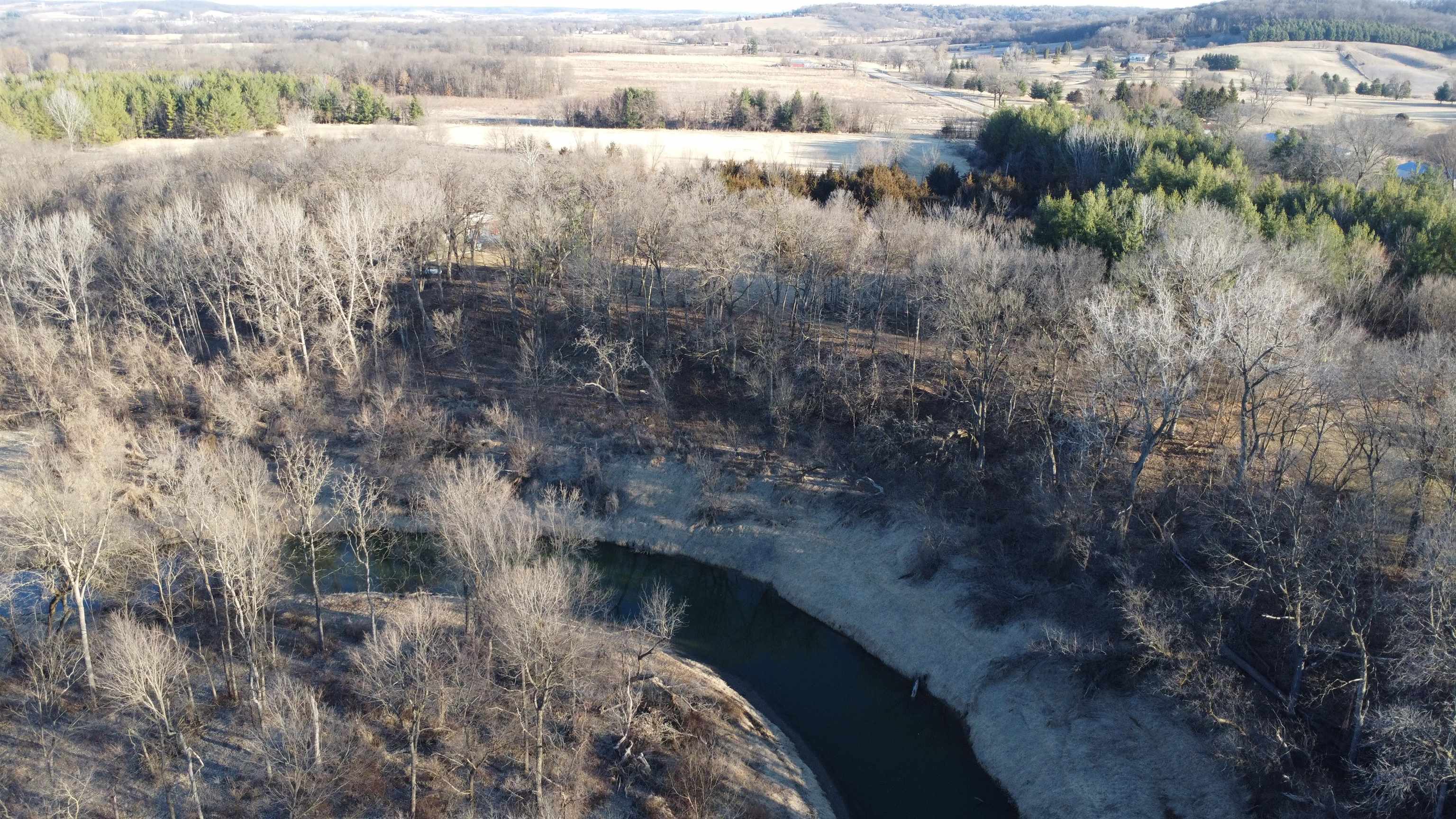 20 Acres /- Tbd S Crazy Hollow Road Hanover, IL 61041 - Photo 3 of 29 a view of a lake from a yard
