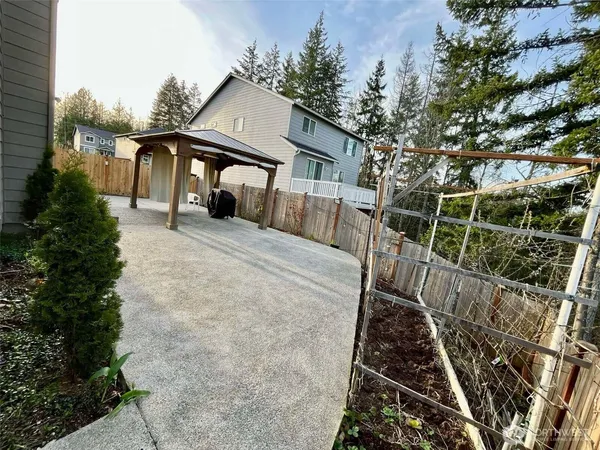 a front view of a house with parking space