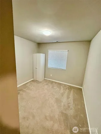 an empty room with a natural light