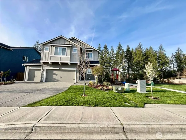 a front view of house with yard
