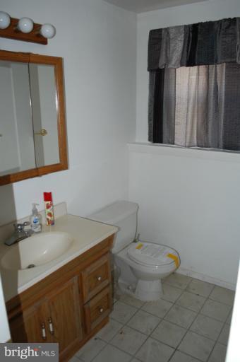 8907 Parlo Road Nottingham, MD 21236 - Photo 7 of 13 Half Bath- Lower Level