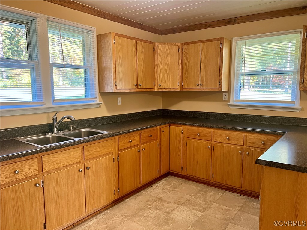 2733 Indian Oak Road Crewe, VA 23930 - Photo 11 of 31 a kitchen with granite countertop cabinets sink and window