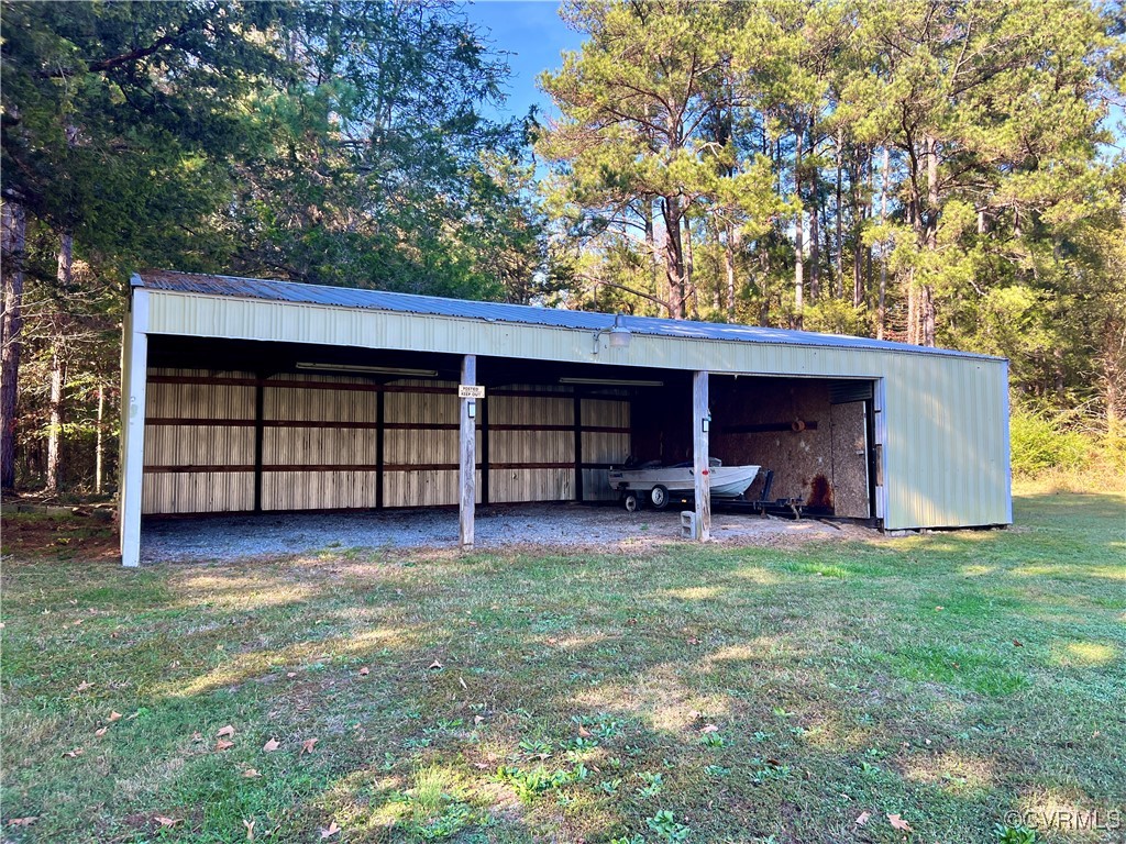 2733 Indian Oak Road Crewe, VA 23930 - Photo 26 of 31 a view of a house with a yard and porch