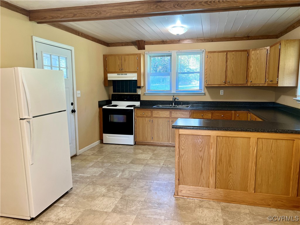 2733 Indian Oak Road Crewe, VA 23930 - Photo 9 of 31 a kitchen with stainless steel appliances granite countertop a refrigerator sink and cabinets