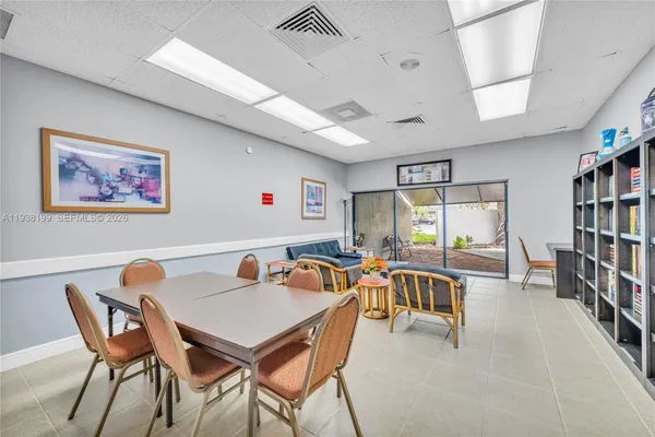 swimming pool view with seating space