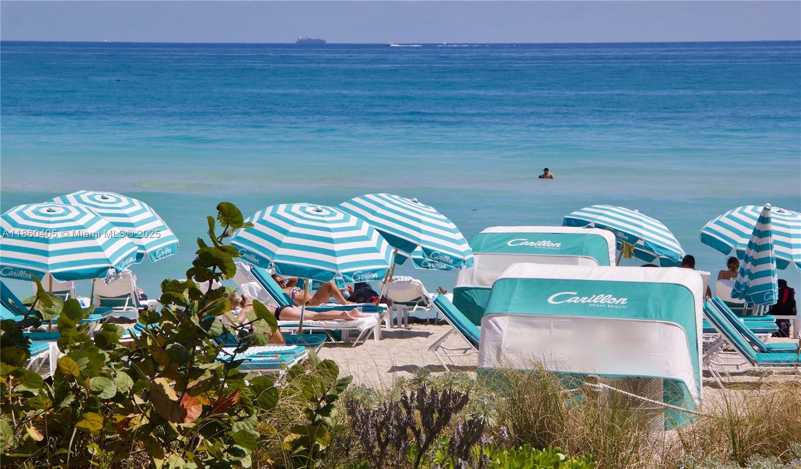 6899 Collins Avenue, Unit 1905 Miami Beach, FL 33141 - Photo 22 of 29 a picture of a table and chairs in patio