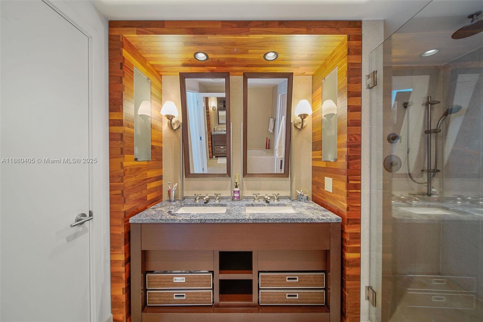 6899 Collins Avenue, Unit 1905 Miami Beach, FL 33141 - Photo 4 of 29 a bathroom with a sink double vanity and a mirror