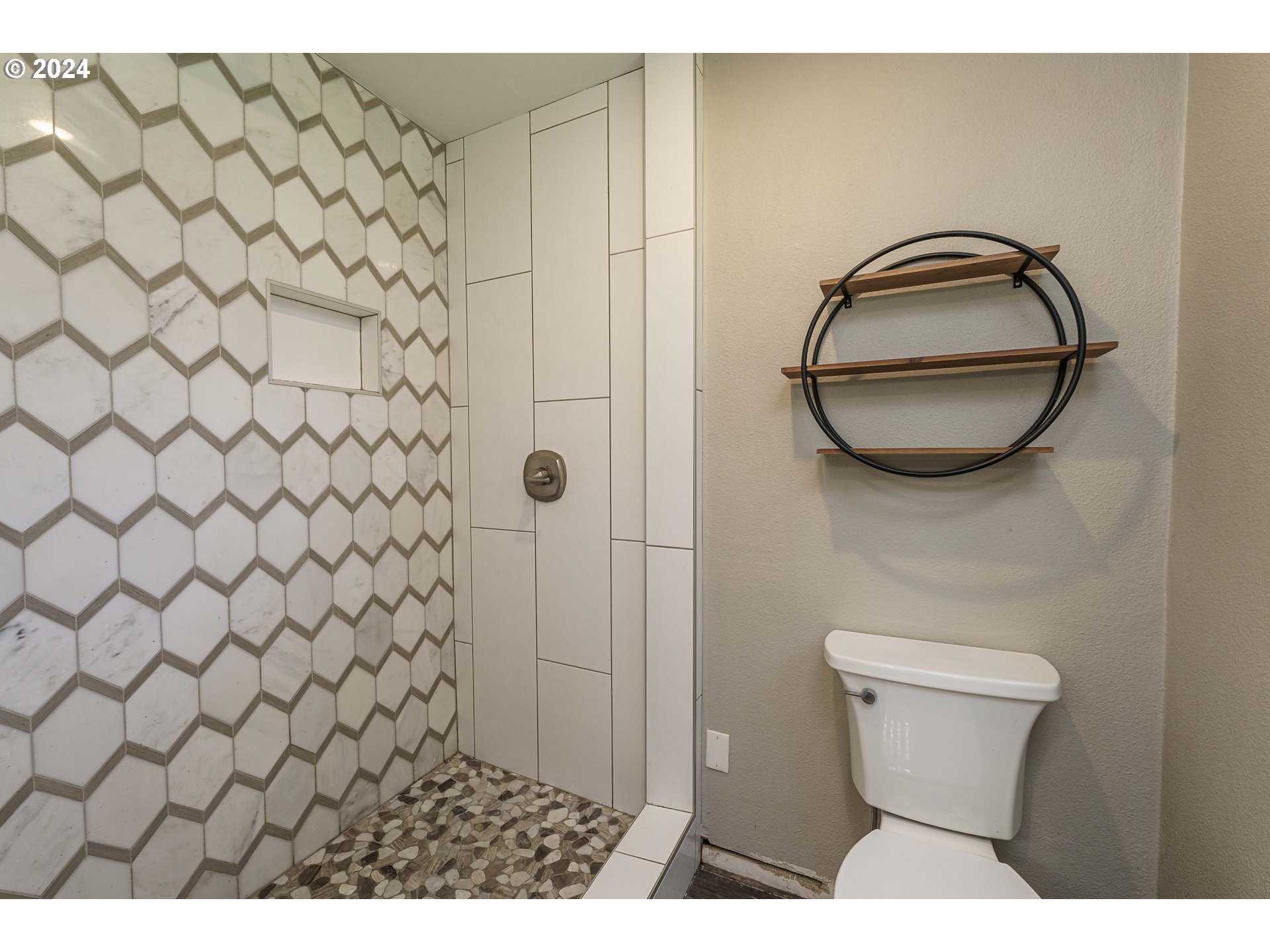 19625 Southeast Jacoby Road Sandy, OR 97055 - Photo 22 of 47 a bathroom with a toilet and a shower curtain
