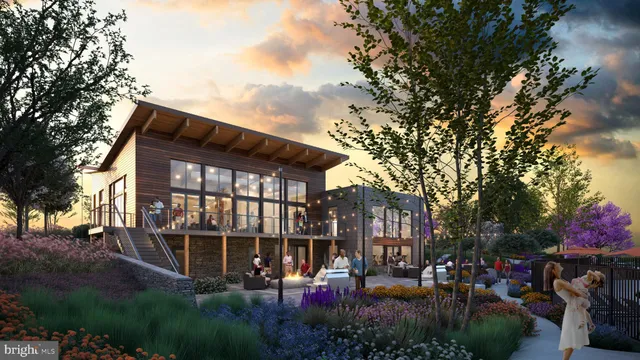 a view of a house with sitting area and garden